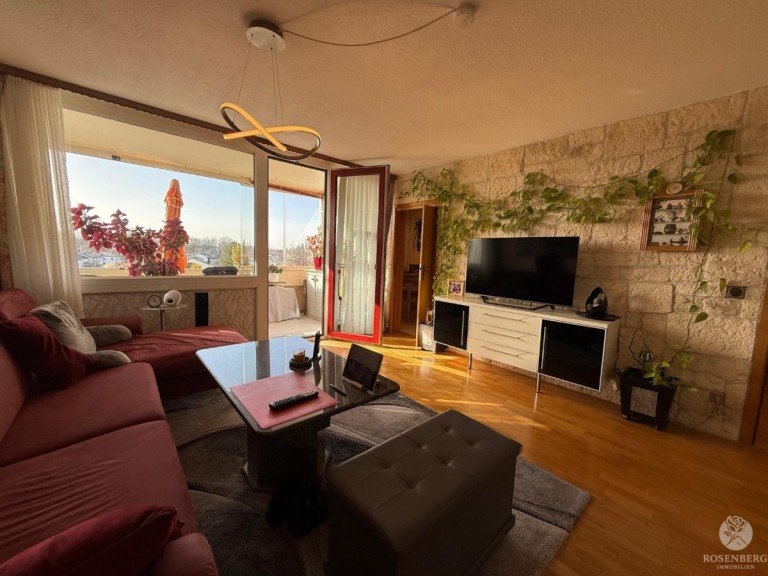 Wohnzimmer Unterhaching Etagenwohnung Lichtdurchflutetes Zuhause mit Loggia, Aufzug und nachhaltiger Geothermie